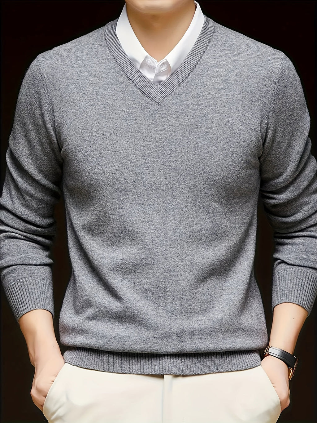 Men's V-neck jumper close-up of knit texture