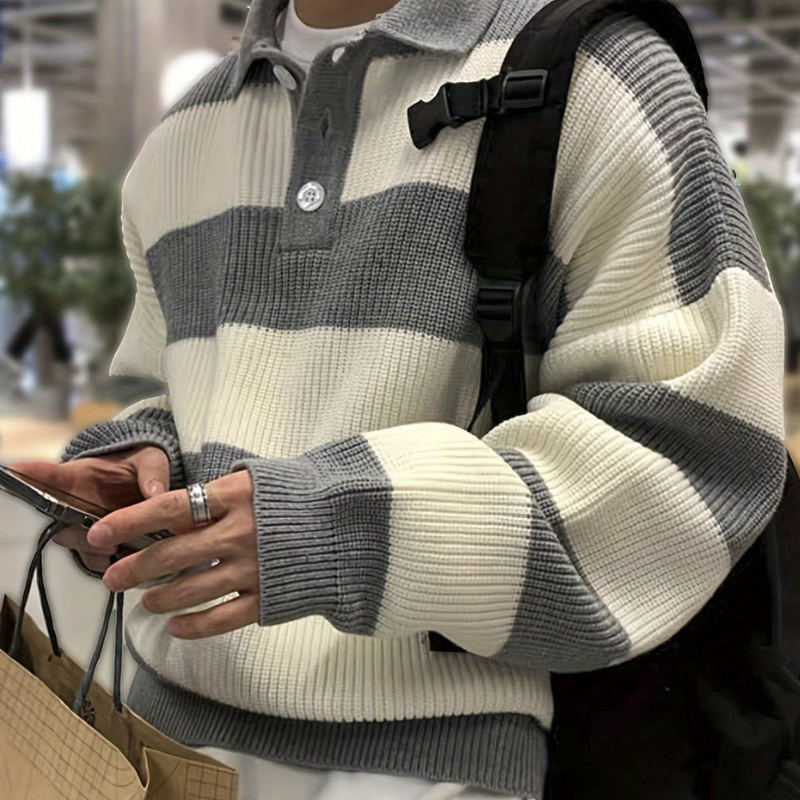 Grey and white striped jumper front view