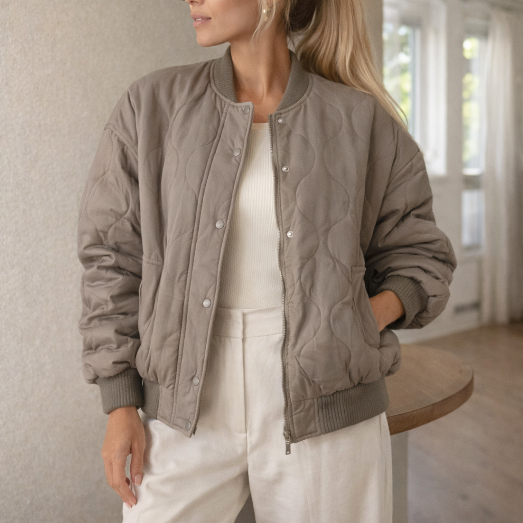 Lightly padded bomber jacket with popper fastening