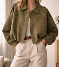Oversized bomber jacket with shoulder epaulettes front view