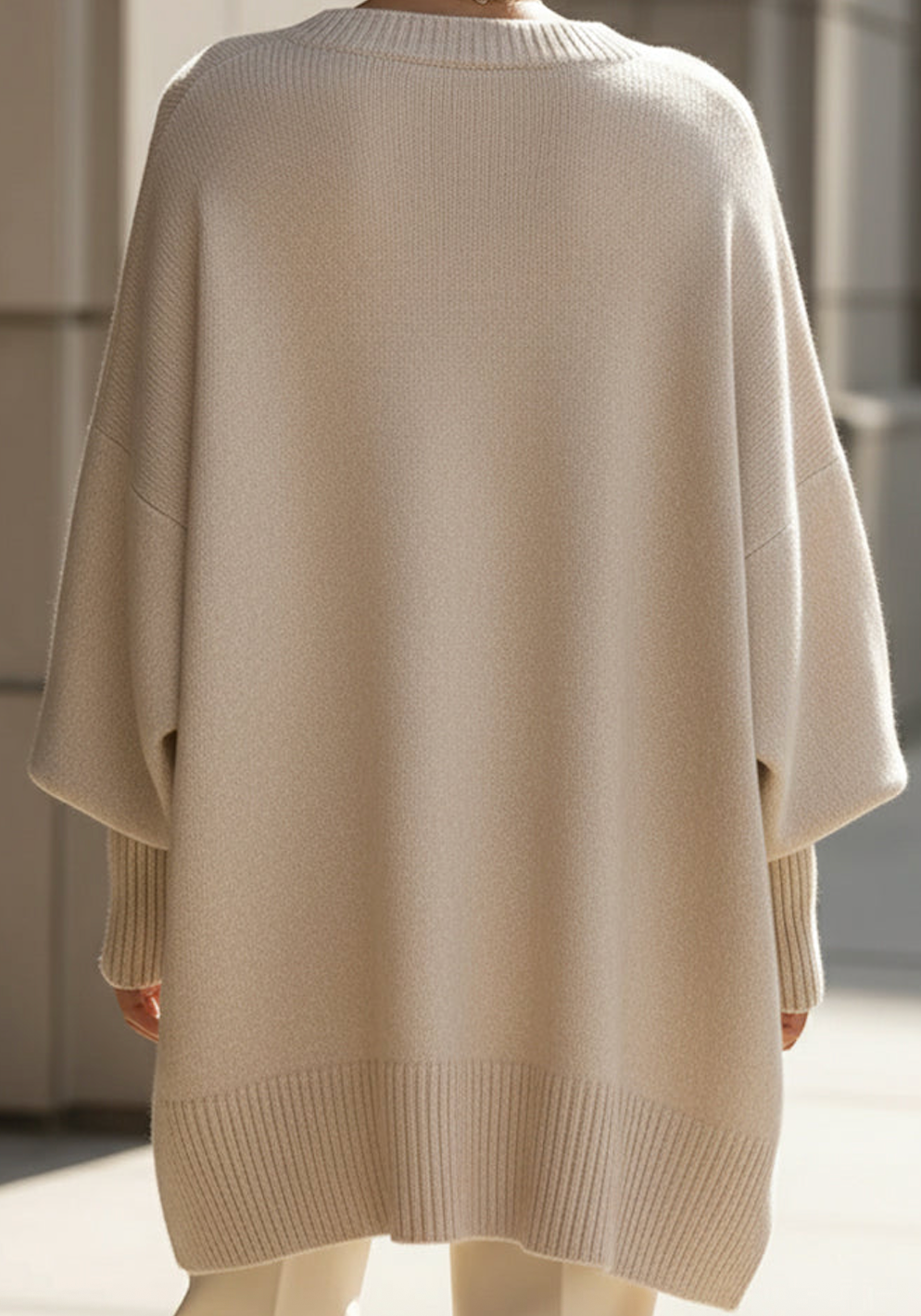 Model wearing oversized knit jumper