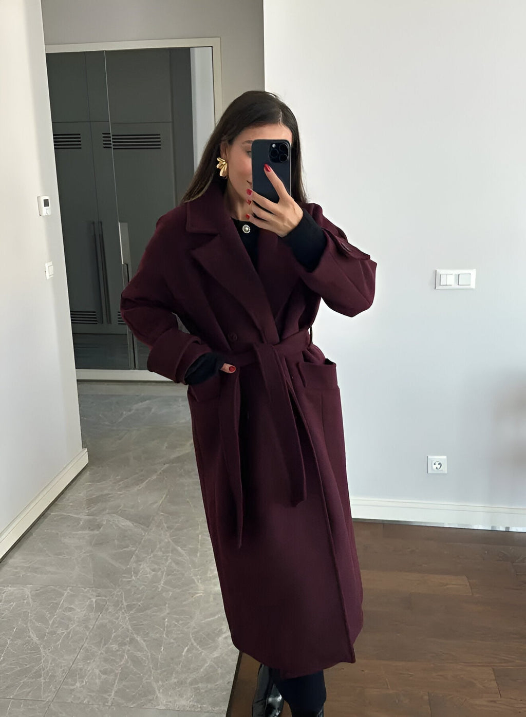 Full length view of burgundy coat