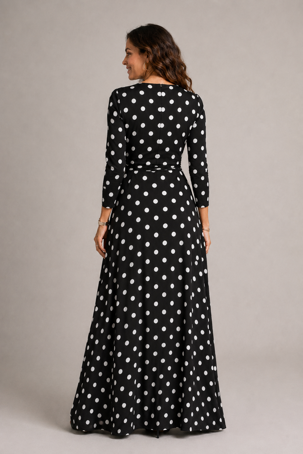 Black polka dot maxi dress detail view