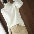 Roll neck jumper front view