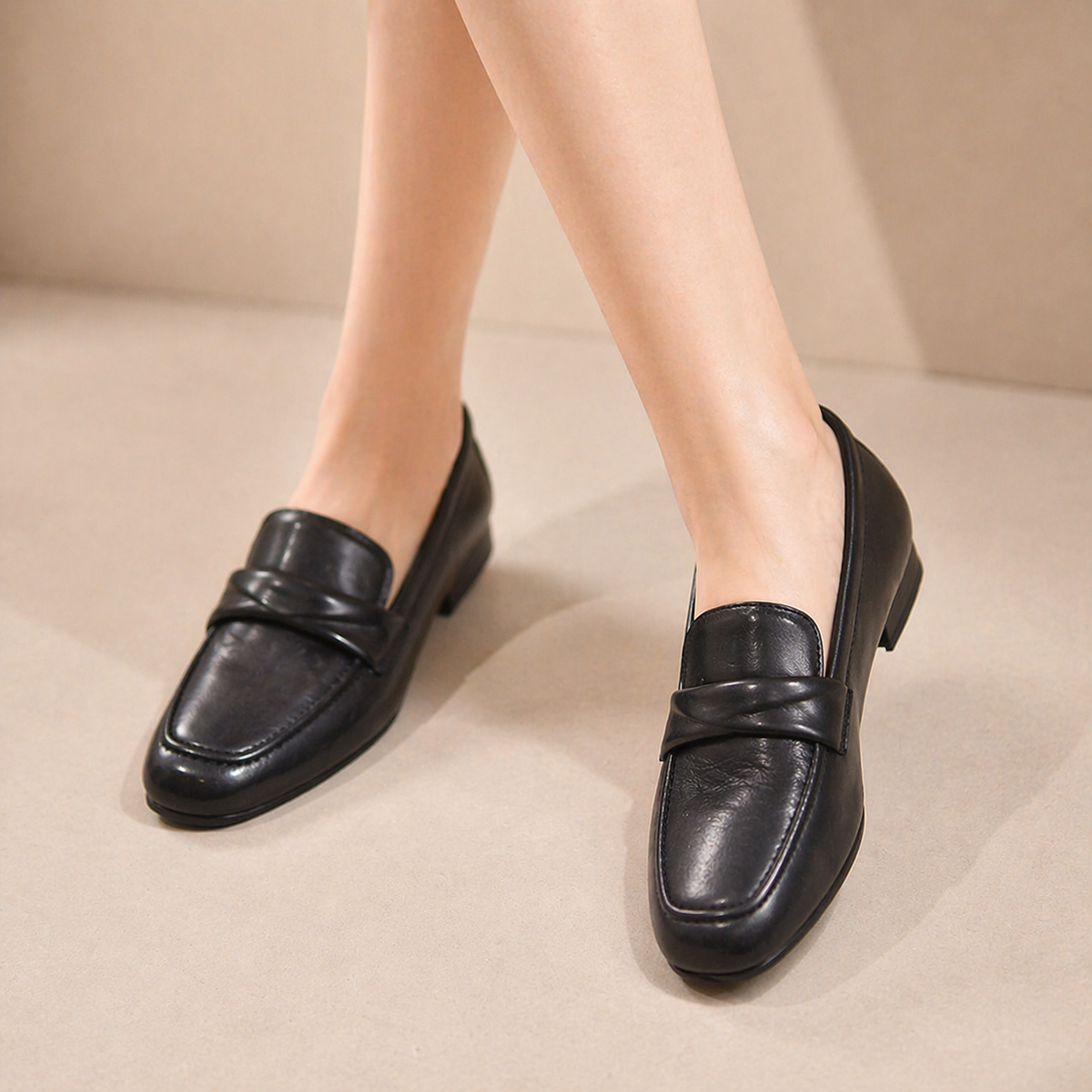 Pair of shearling loafers on display