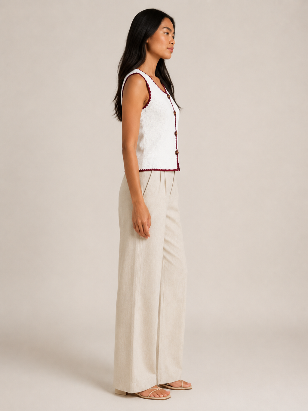 Knit waistcoat styled with jeans