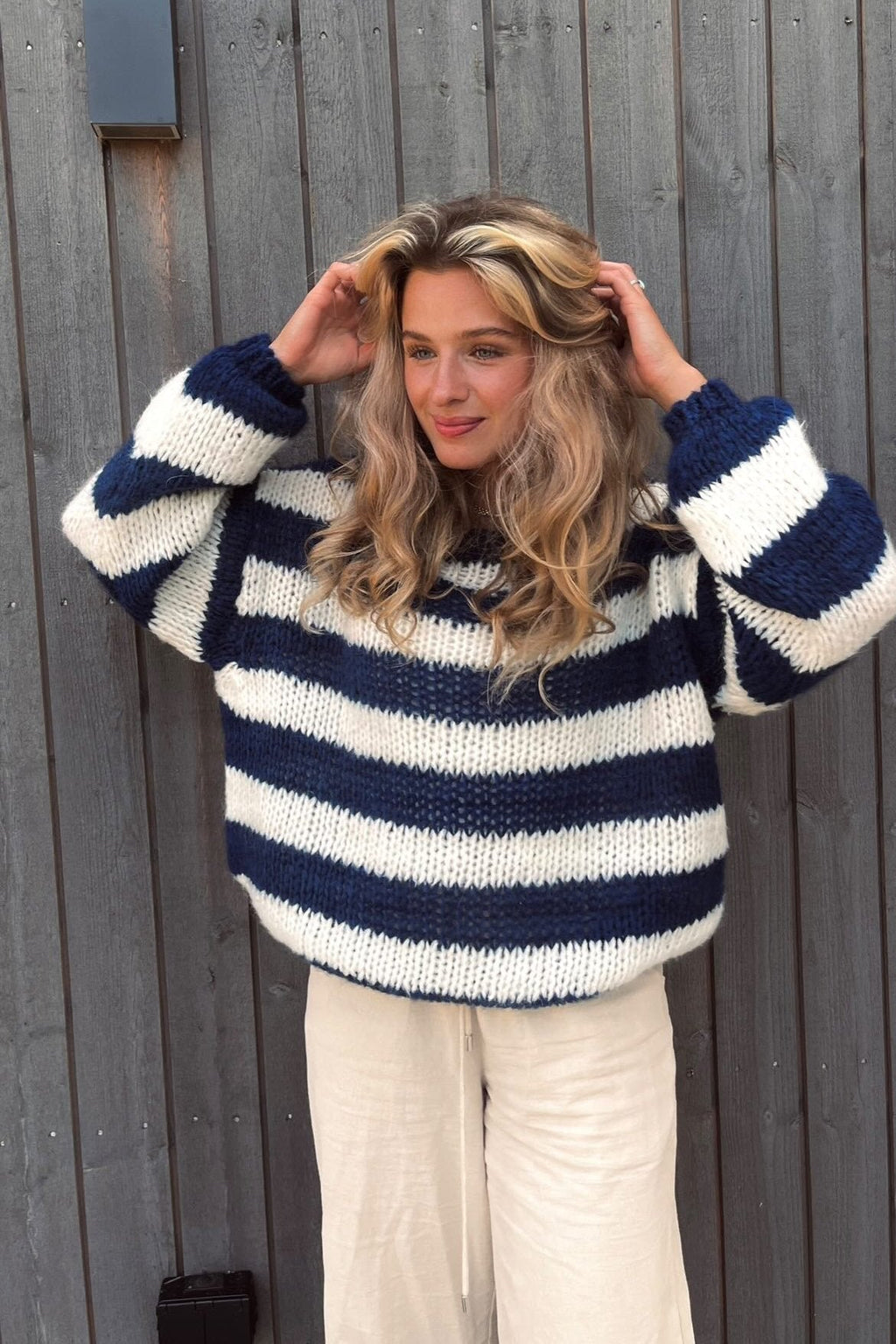 Striped jumper side view