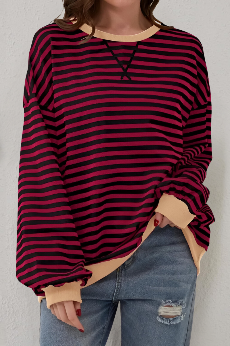 Striped sweatshirt styled with jeans