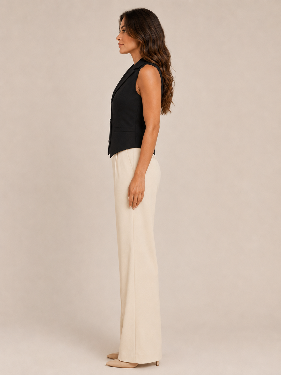 Black tailored waistcoat styled with blouse