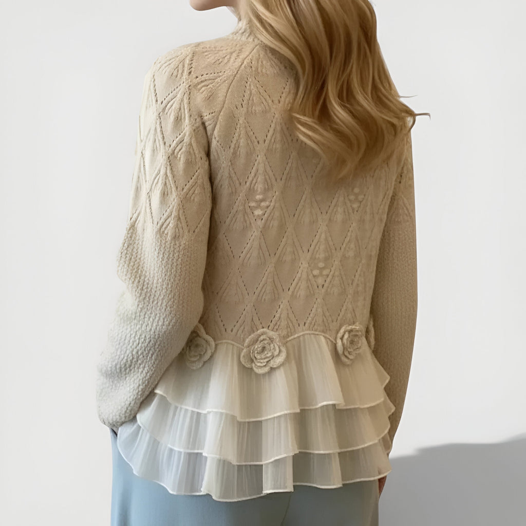 Beige ruffle jumper fabric texture close-up