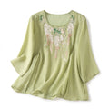 Embroidered top styled with jeans