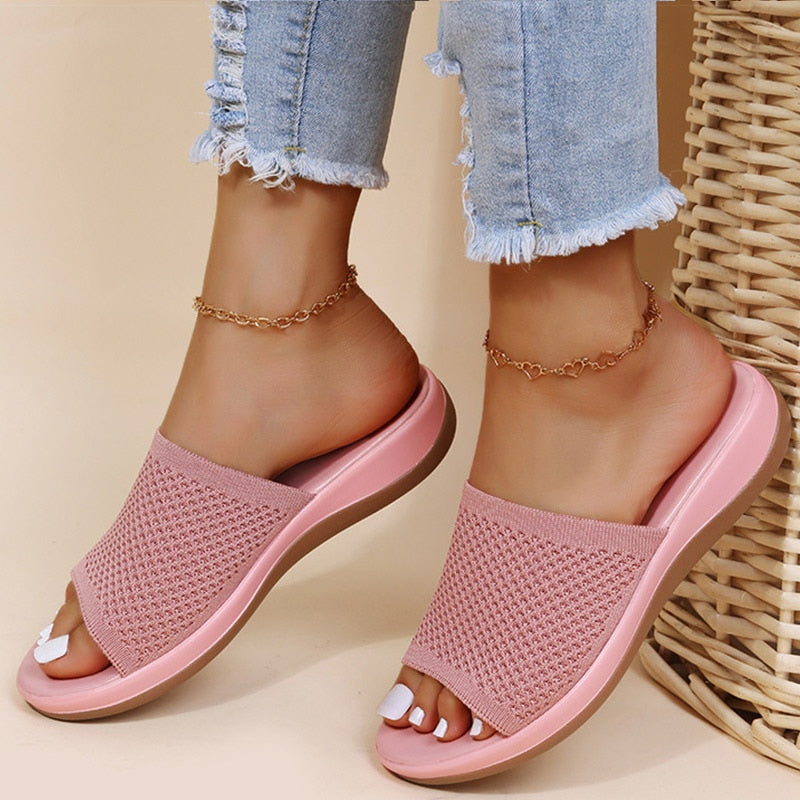 Pink breathable mesh slide sandal front view