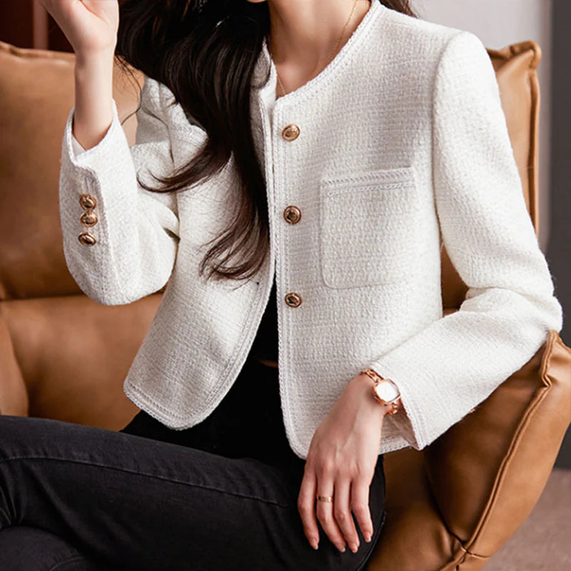 Short blazer worn with casual outfit