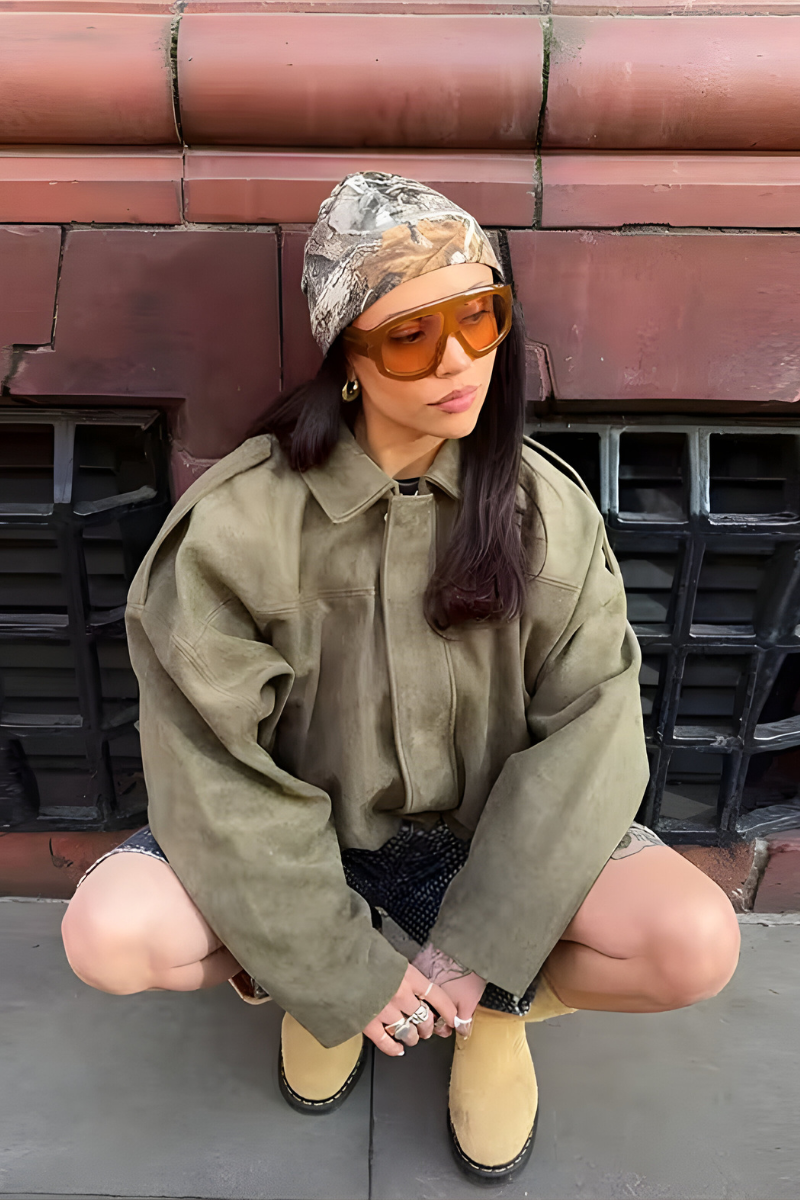 Model wearing oversized tailored coat