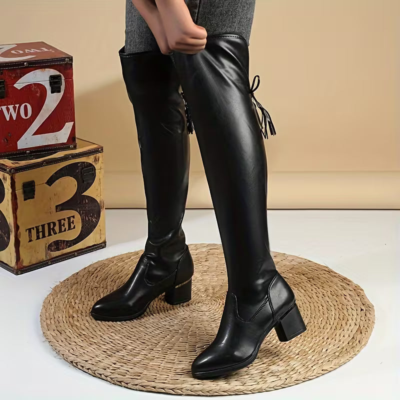 Black cushioned boots side view