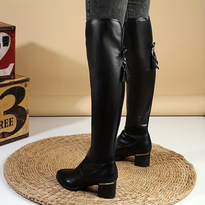 Pair of black boots top view