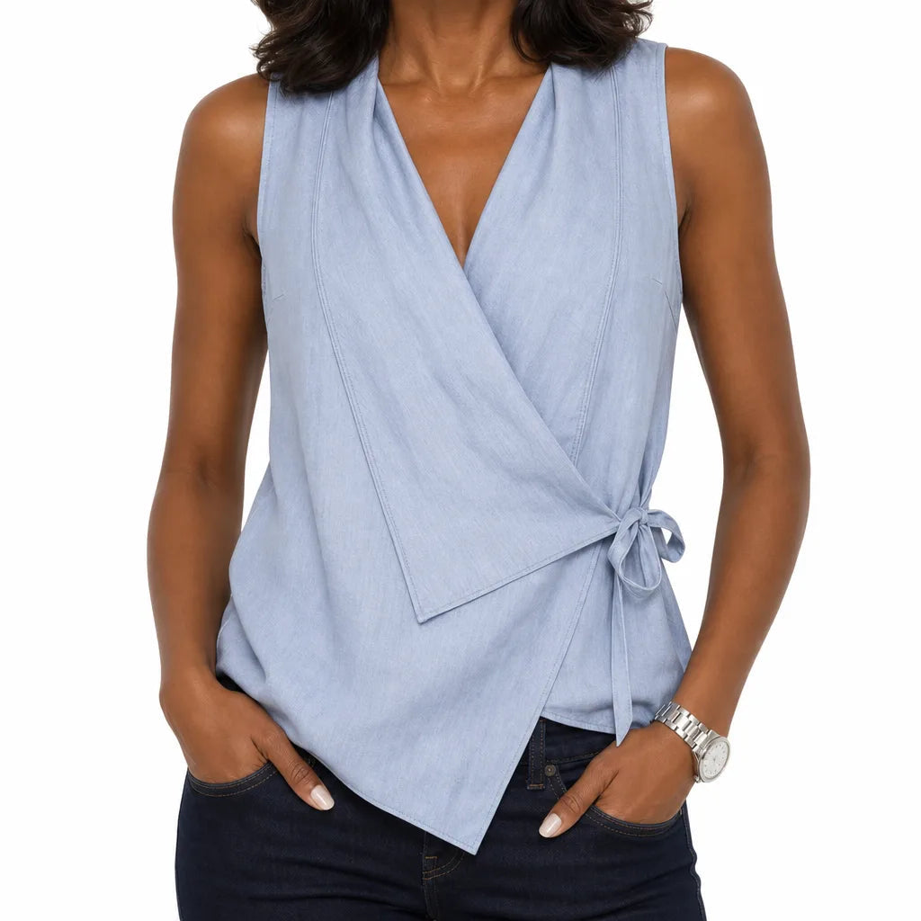 Woman wearing draped wrap blouse front view