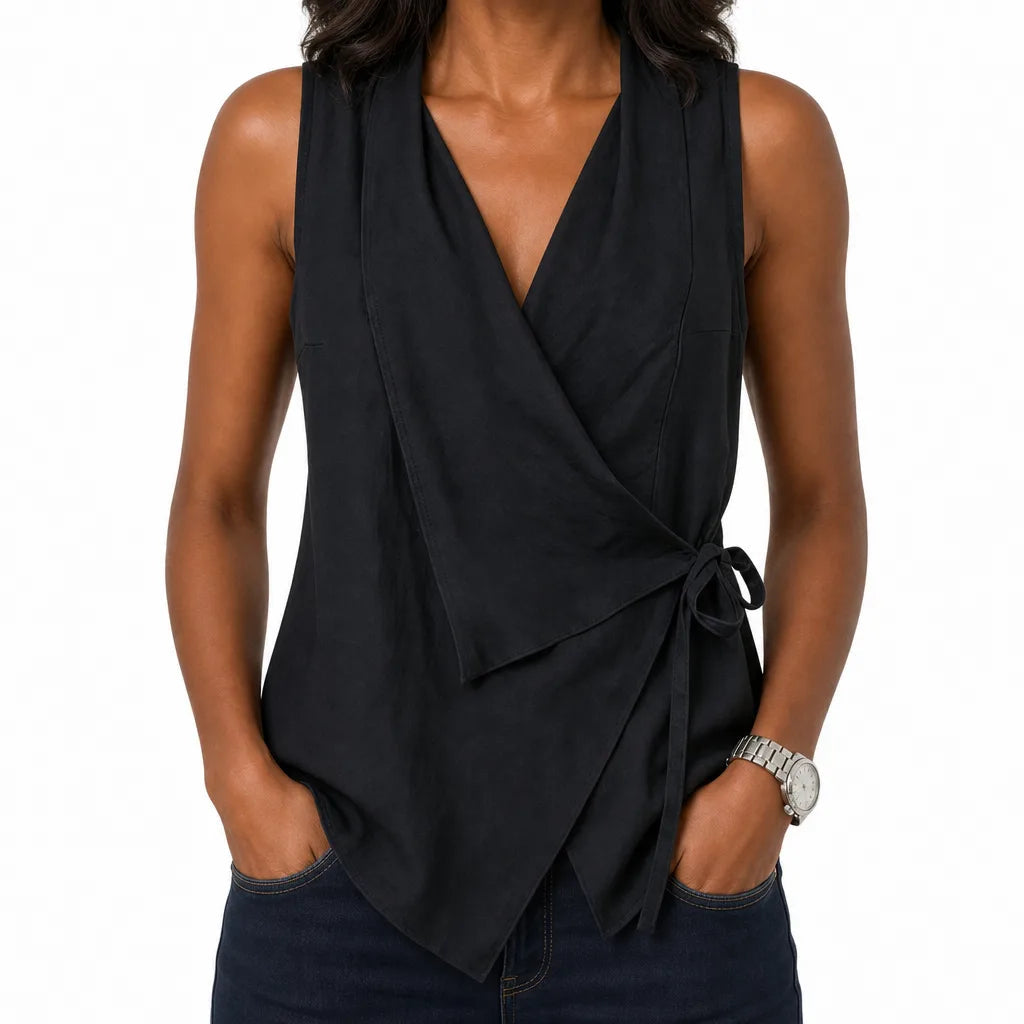 Sleeveless wrap blouse styled with trousers