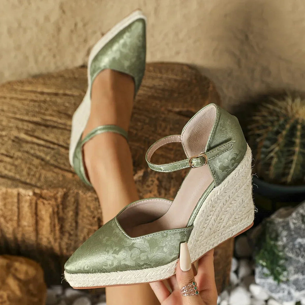 Wedge sandal worn on foot outdoors
