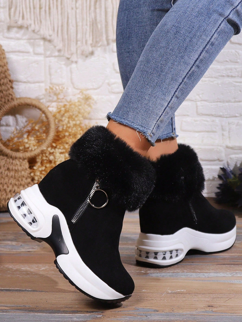 Pair of black faux fur platform boots