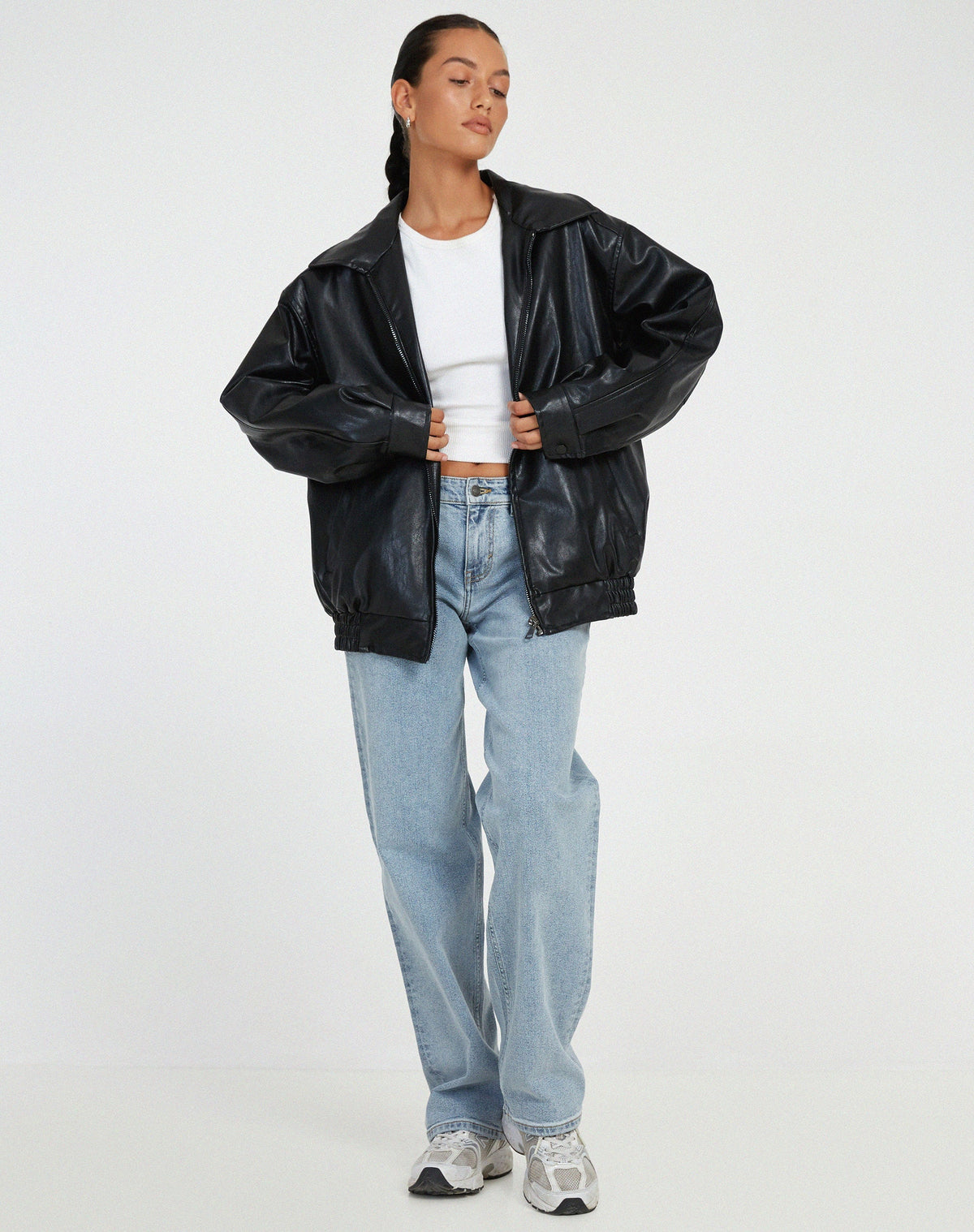 Model wearing oversized bomber jacket