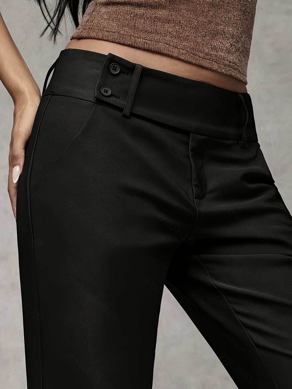 Close-up of trouser waistband detail