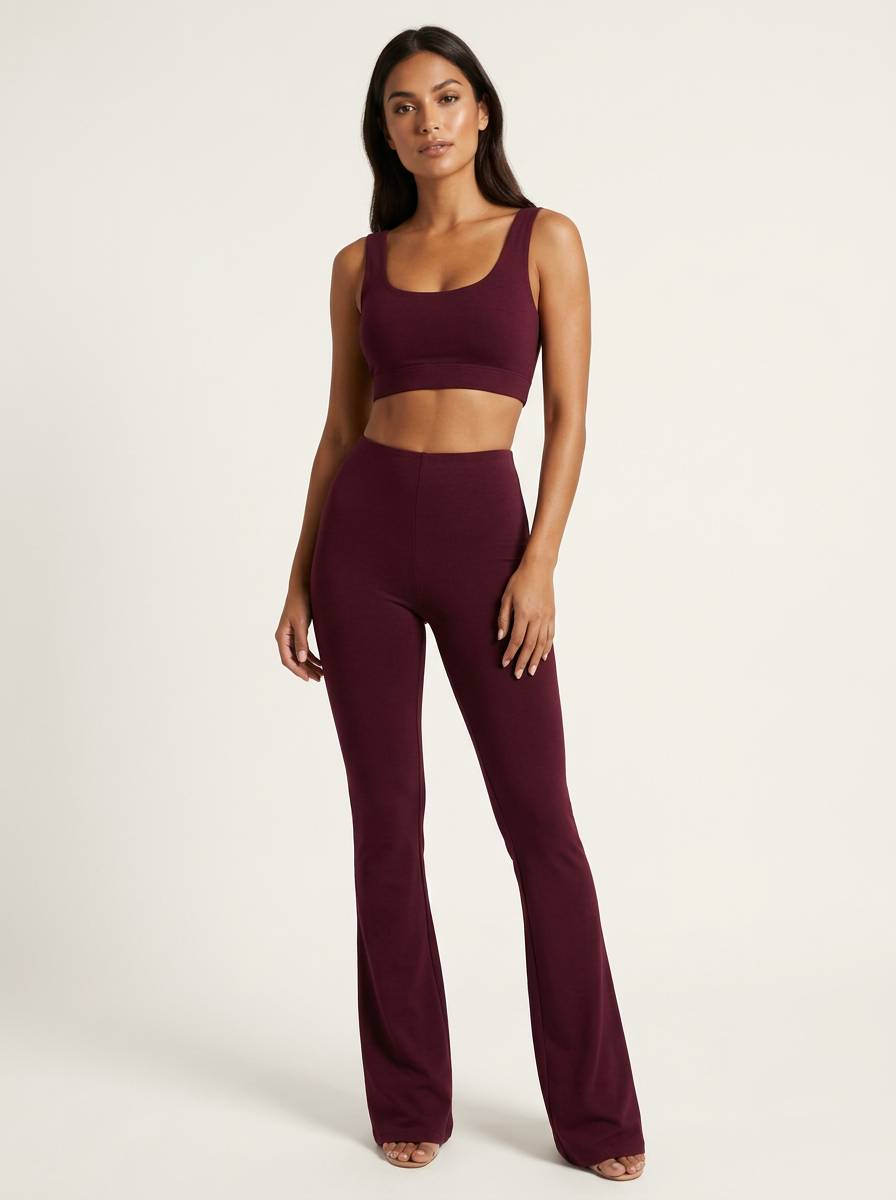 Women's high-waisted flared trousers folded flat
