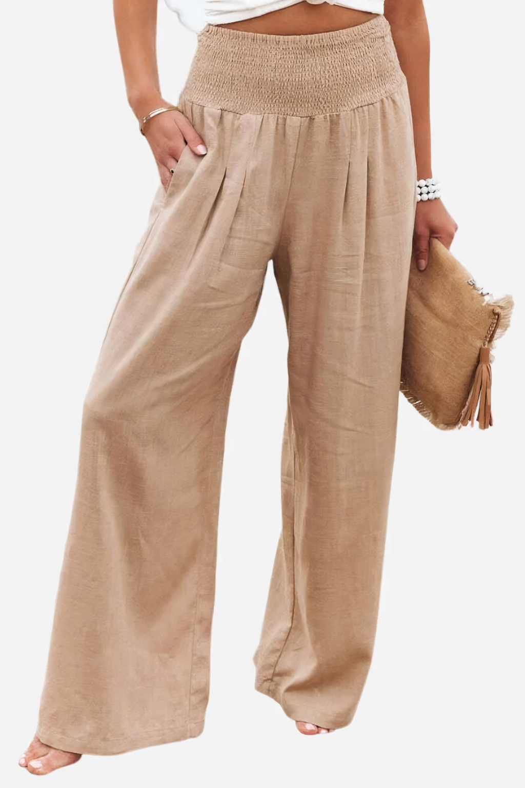 Woman wearing high-waisted palazzo trousers front view