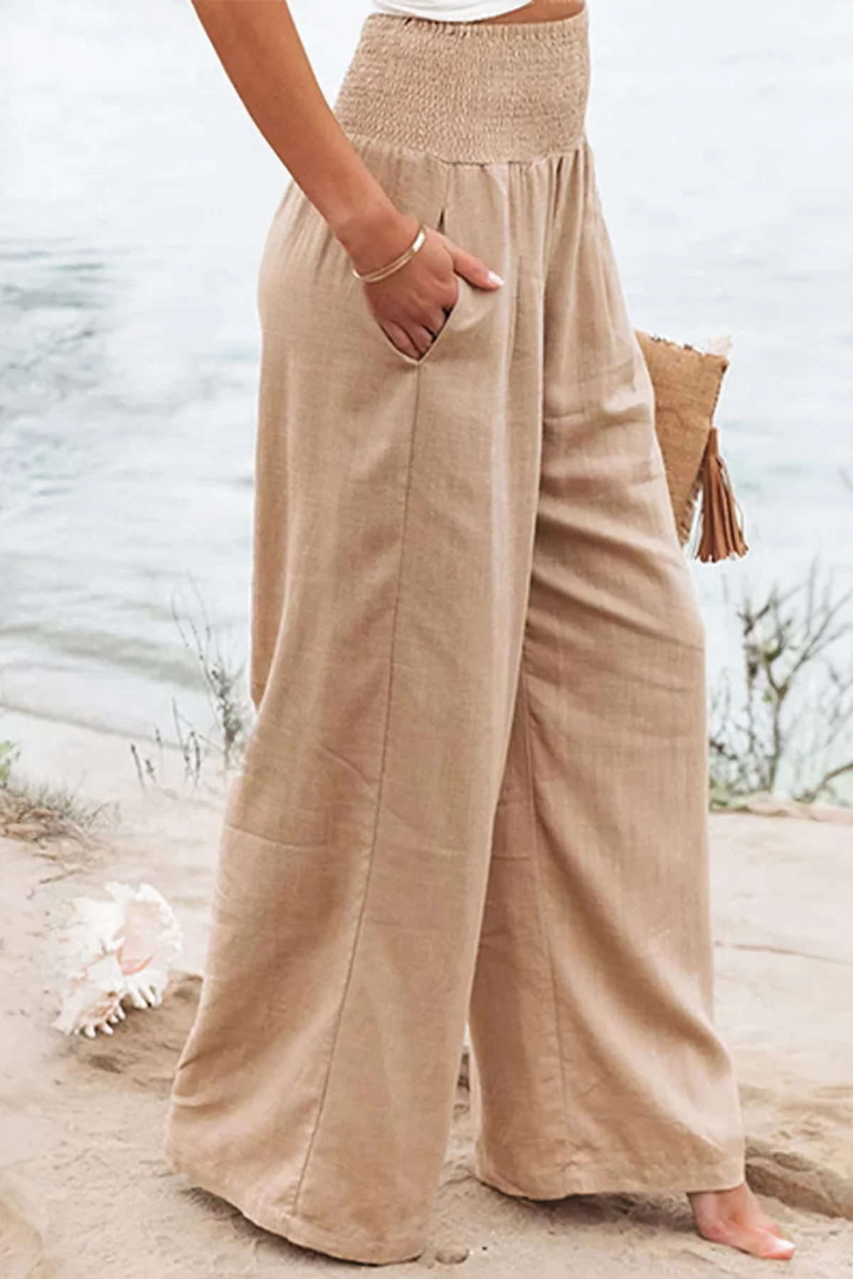 Wide leg palazzo trousers close-up detail