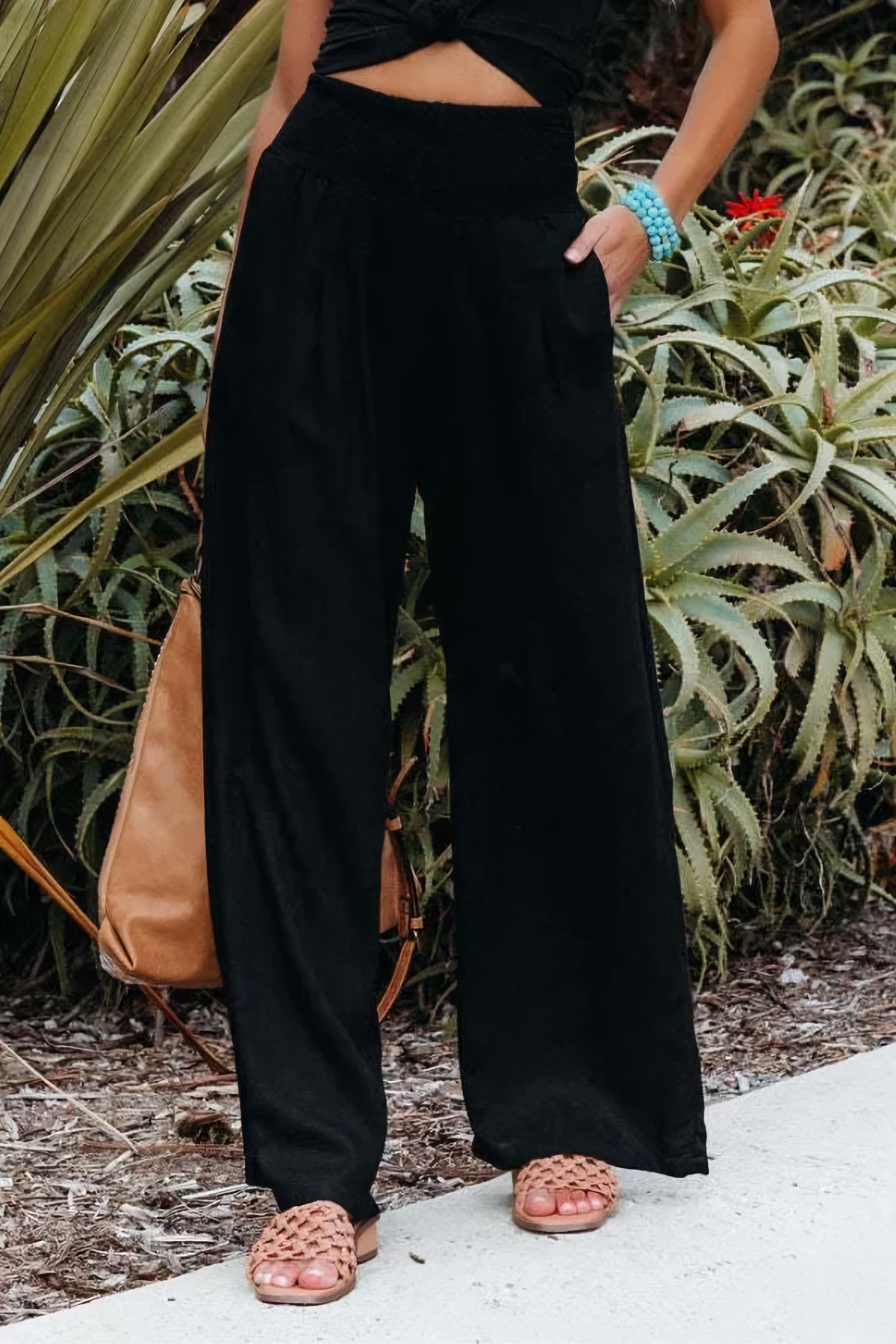 High-waisted trousers side view