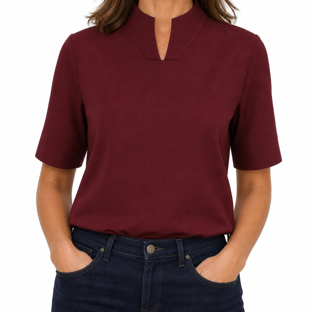 Woman wearing mandarin collar top front view