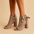 Black block heel boots front view