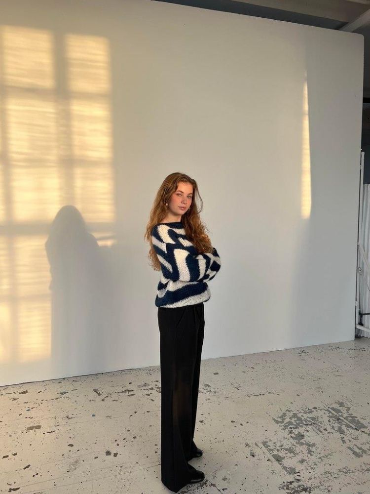 Navy knit jumper side view