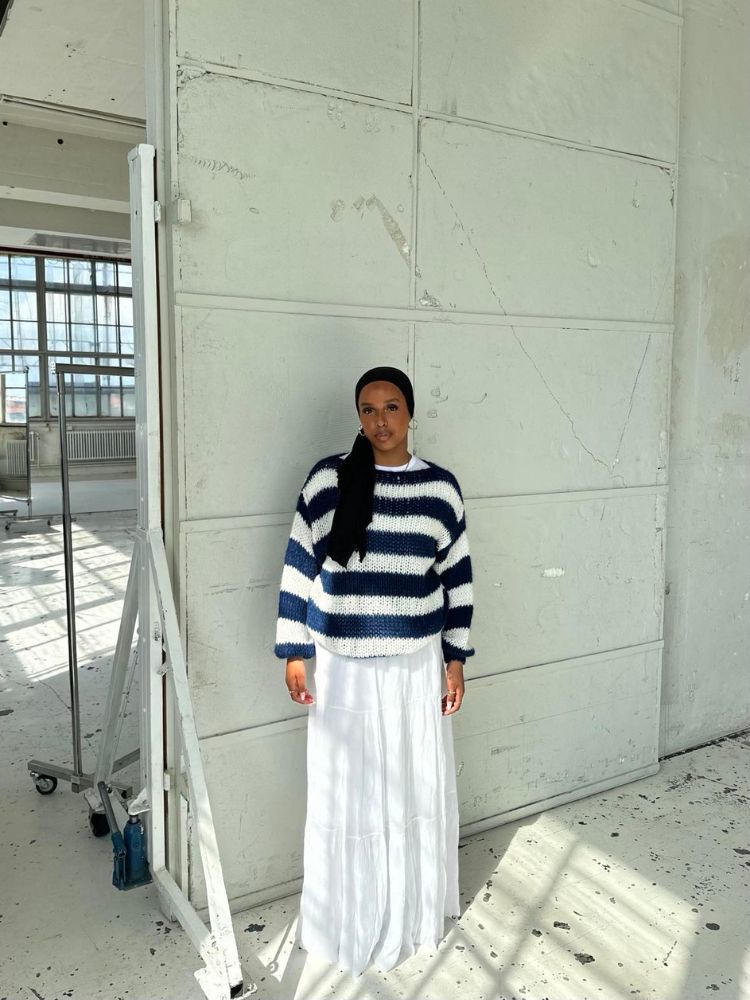 Woman wearing oversized knit jumper