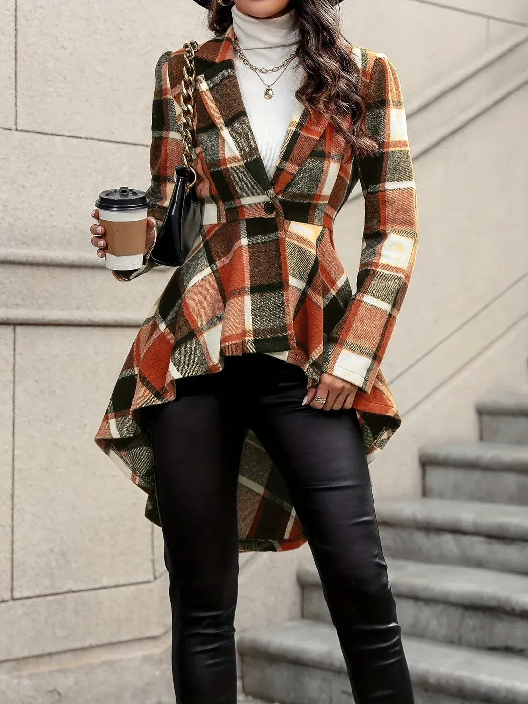 Plaid jacket back view showing high-low hem