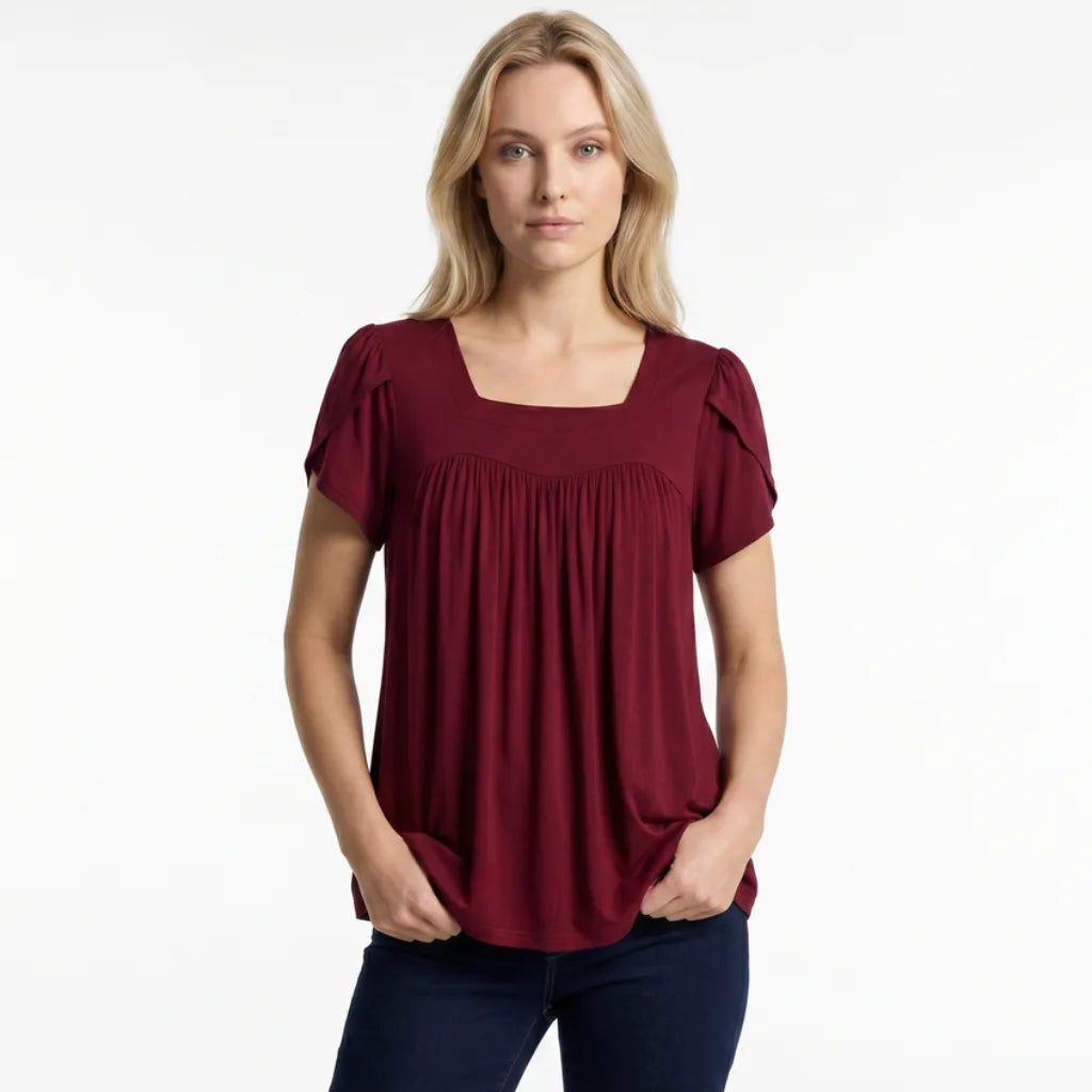Woman wearing puff sleeve blouse front view