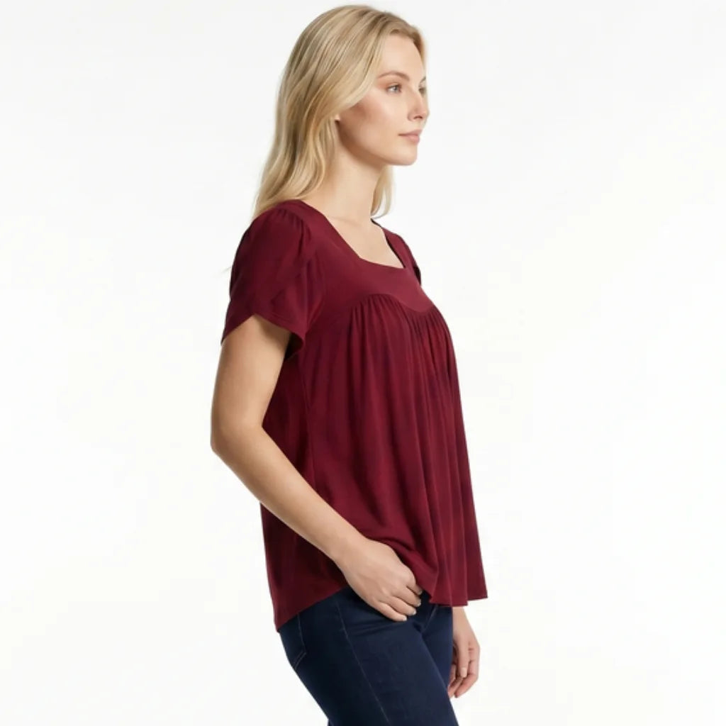 Close-up of square neckline and gathered yoke