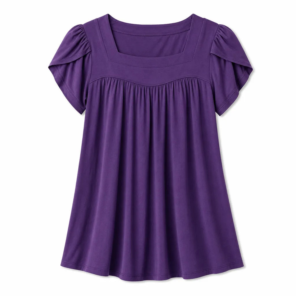 Puff sleeve blouse styled with trousers