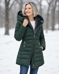 Woman wearing quilted hooded winter coat outdoors