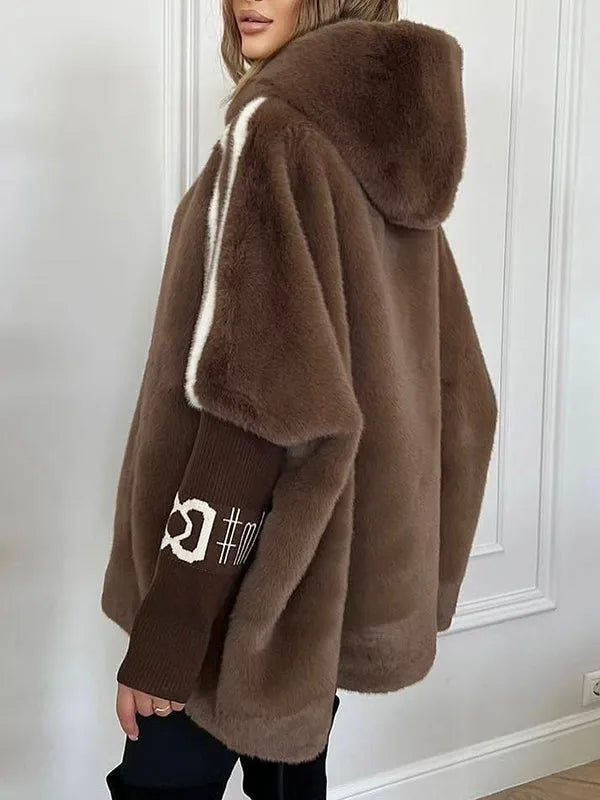 Quilted winter jacket with hood on model