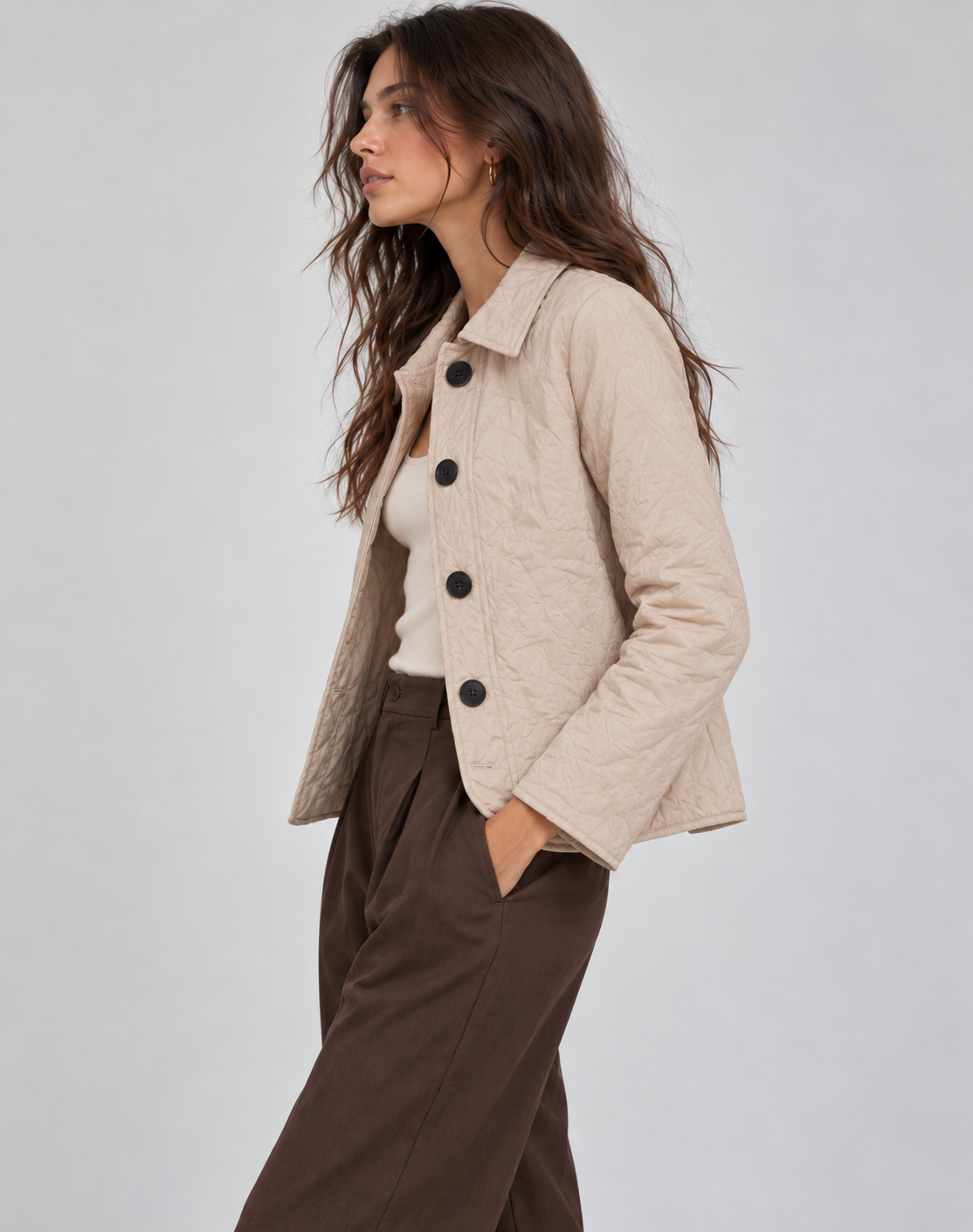 Quilted jacket button fastening close-up