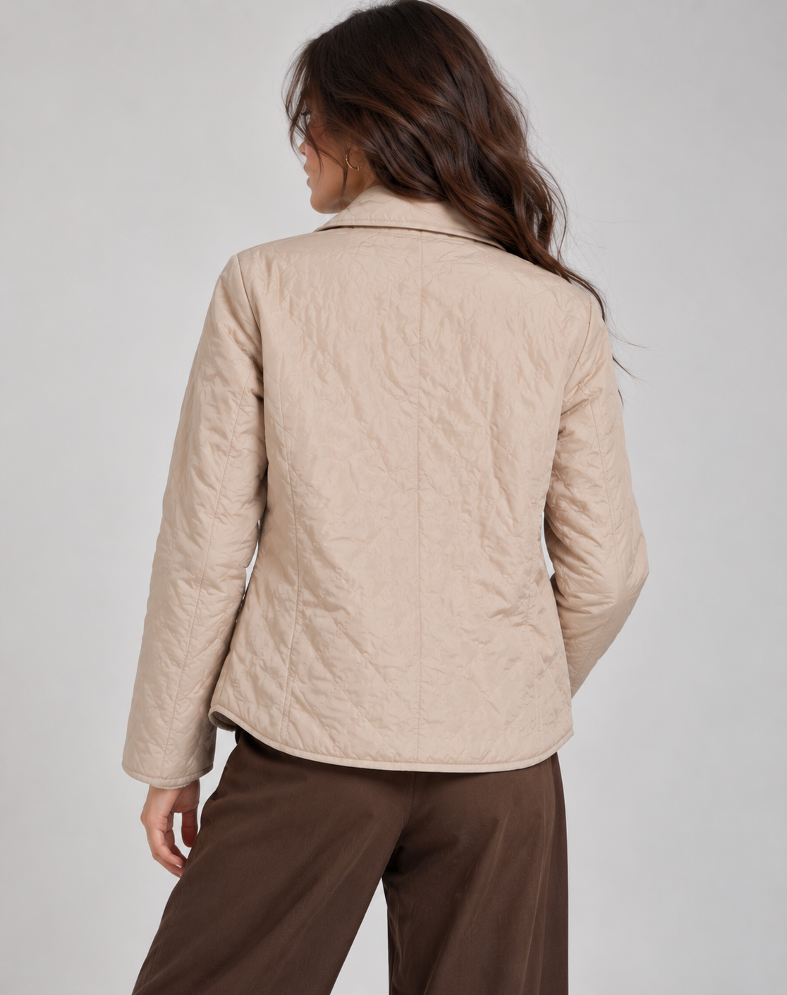 Quilted jacket side view on model