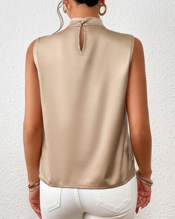 Gold satin blouse with twisted collar detail