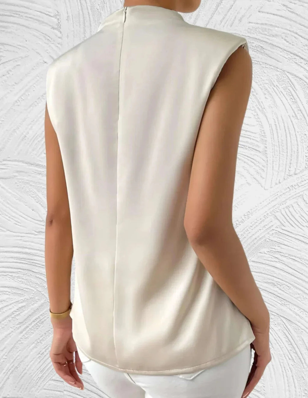 Beige sleeveless blouse detail view