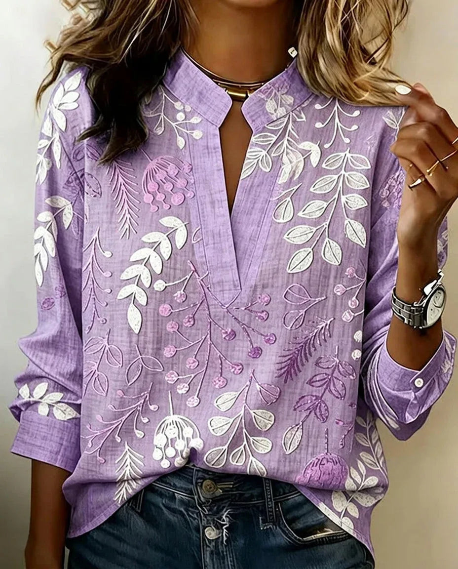 Woman wearing split V-neck blouse front view