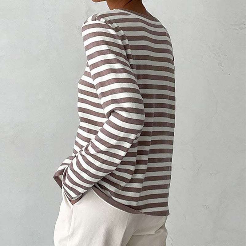Striped jumper folded flat lay