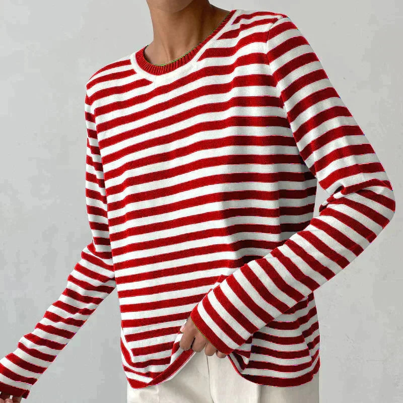 Woman wearing striped jumper with jeans