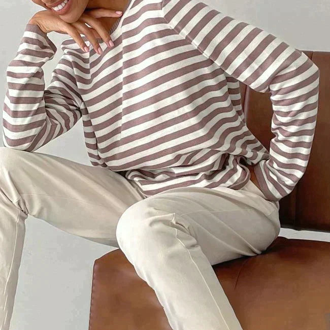 Striped jumper styled with skirt
