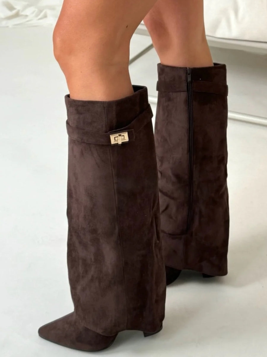 Full length view of knee-high boot