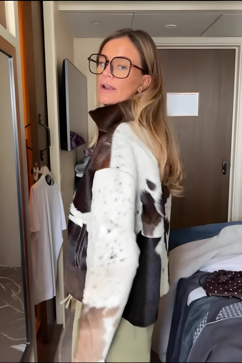 Model wearing brown patterned coat